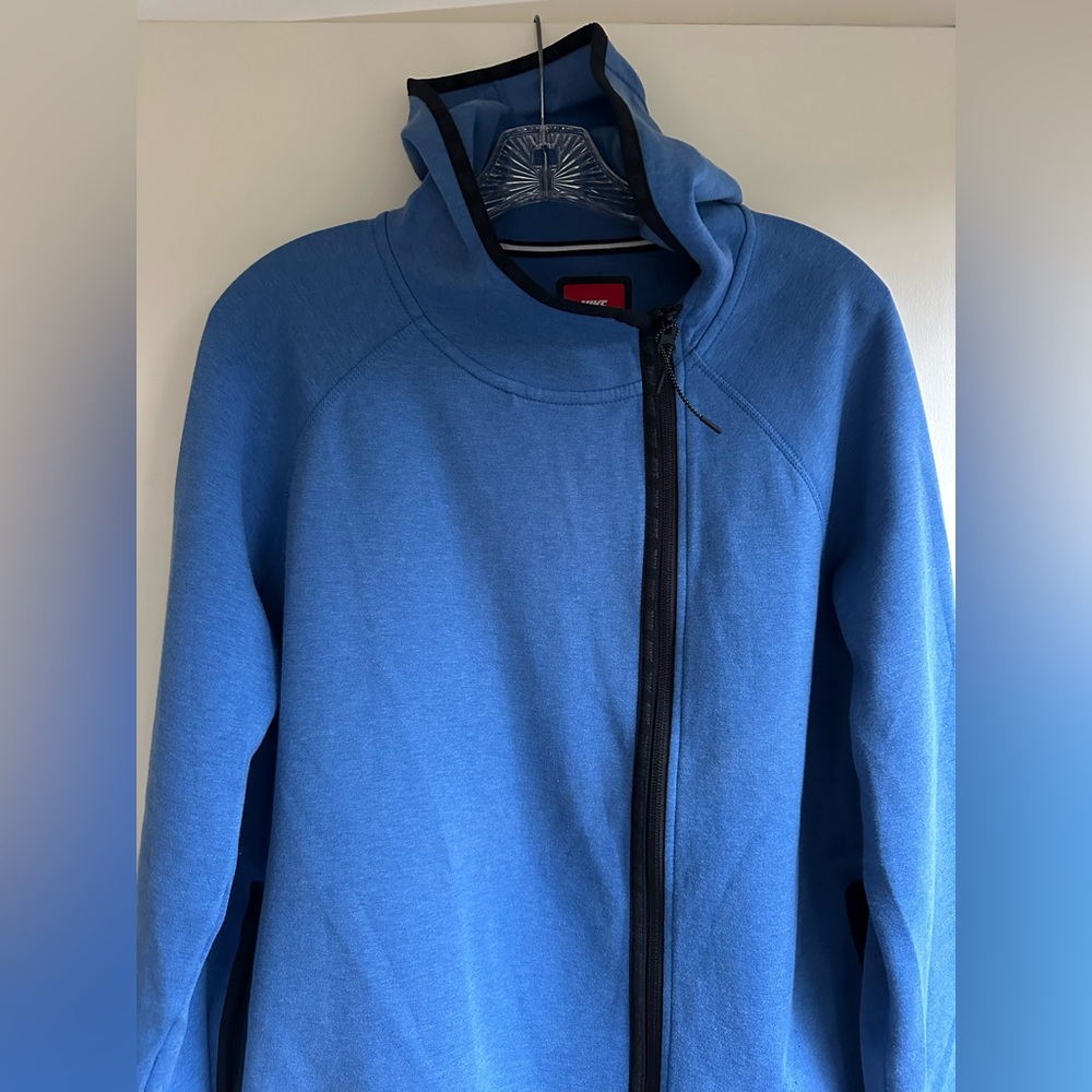 Nike zipper hoodie with asymmetrical back hemline. Womens L